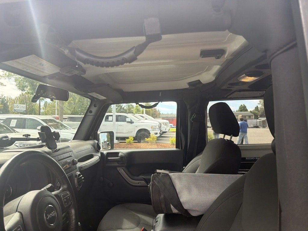 Used 2016 Black Clearcoat Jeep Sport image 5