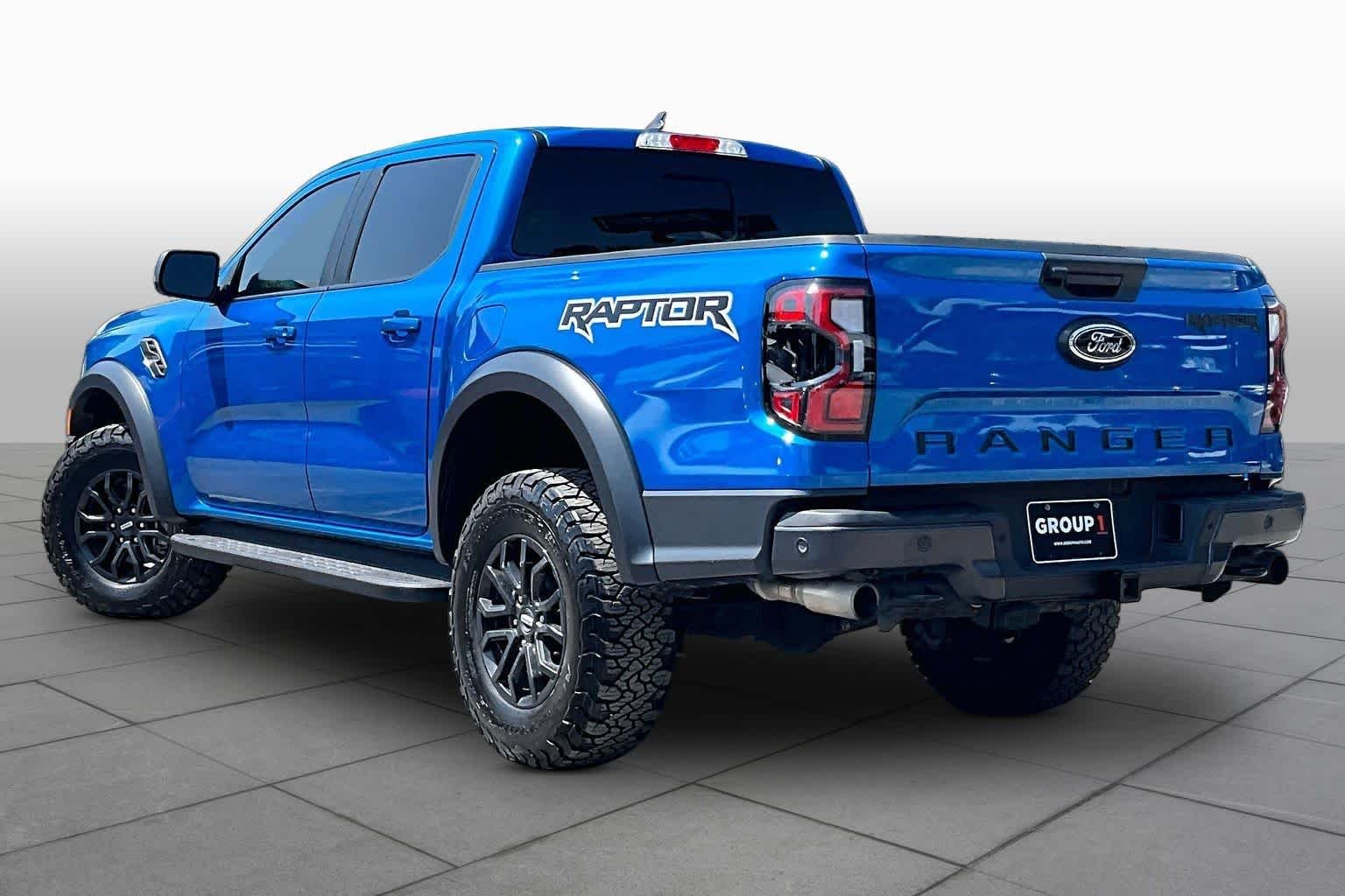 Used 2024 Velocity Blue Metallic Ford Raptor image 12