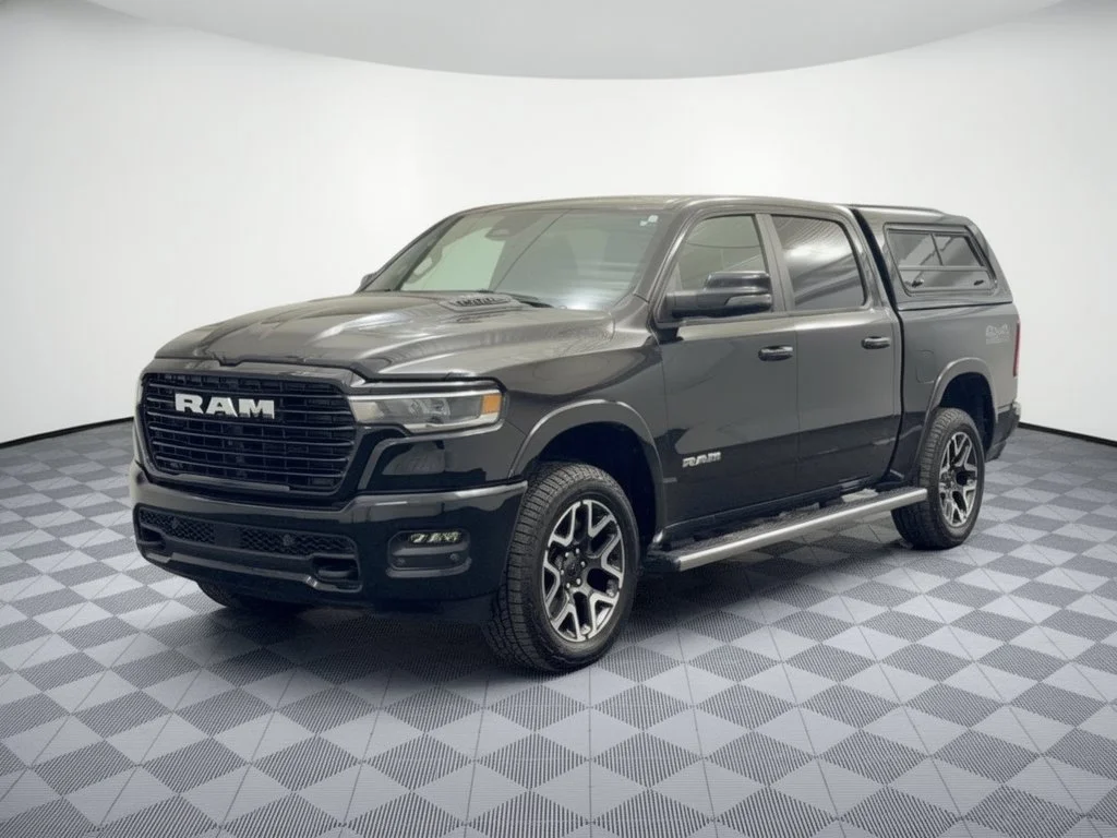 Used 2025 Diamond Black Crystal Pearlcoat Ram Laramie Crew Cab 4x4 57 Box image 1
