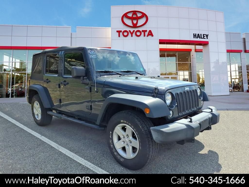 Used 2016 Black Jeep Unlimited Sport image 1