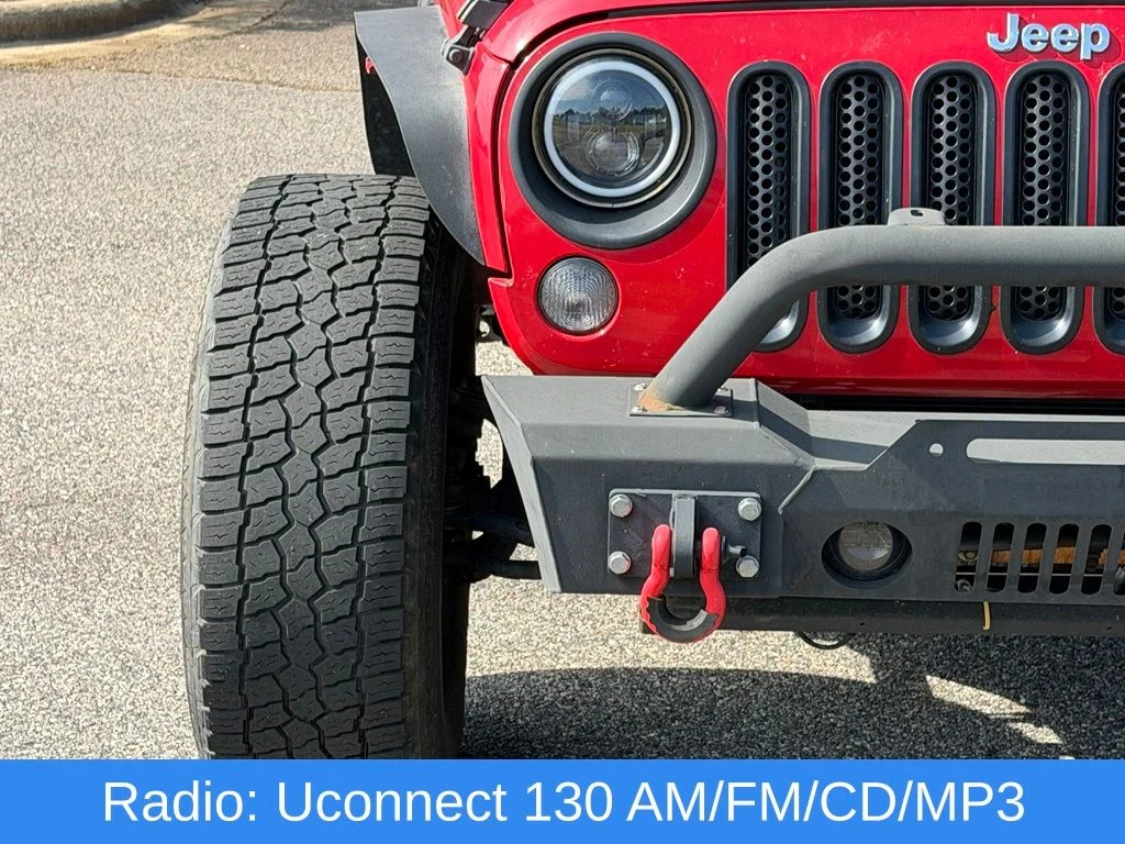 Used 2014 Red Jeep Unlimited Sport image 11