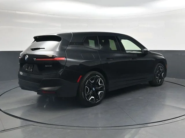 Used 2024 Black Sapphire Metallic BMW xDrive50 image 4