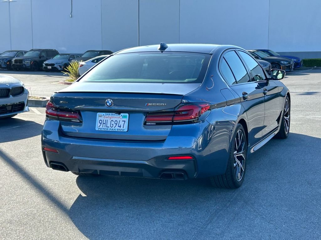 Used 2023 Arctic Race Blue metallic BMW M550i xDrive image 5