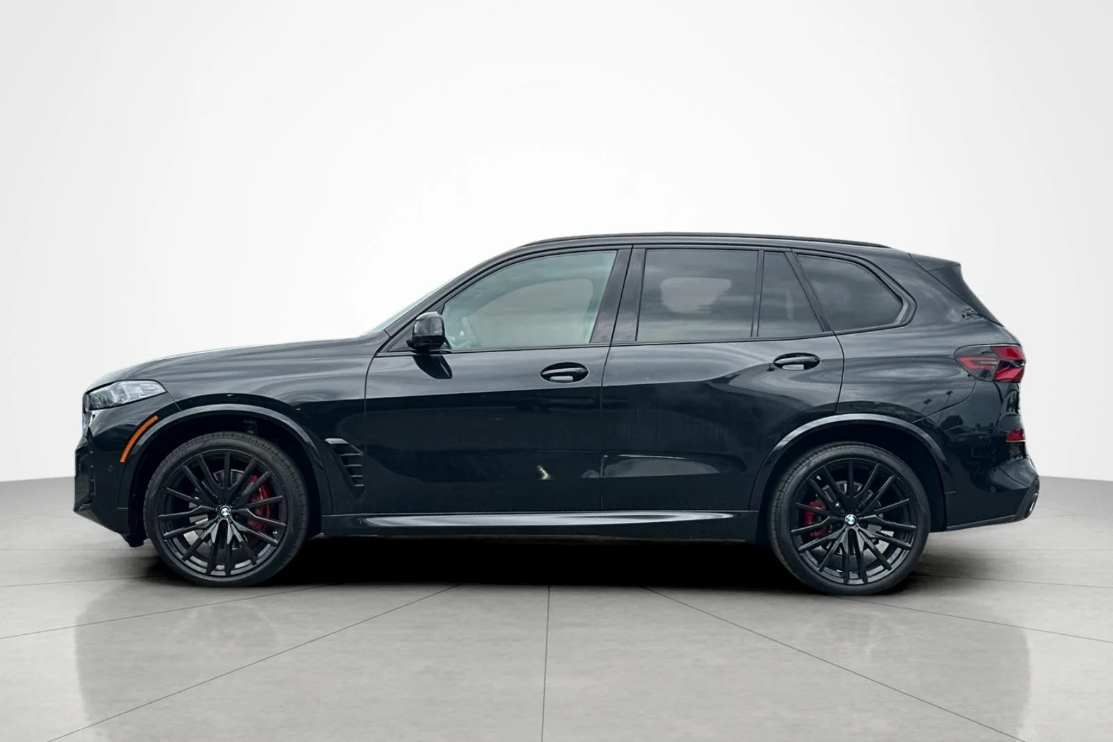 Used 2025 Black Sapphire Metallic BMW sDrive40i image 2