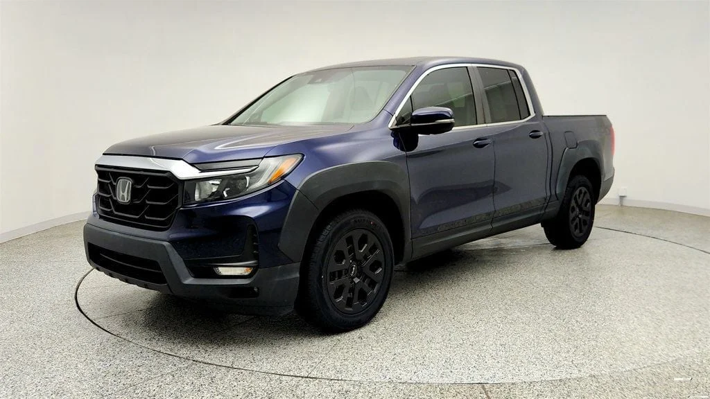 Used 2023 Obsidian Blue Pearl Honda RTL AWD w/ HPD Bronze Package image 1