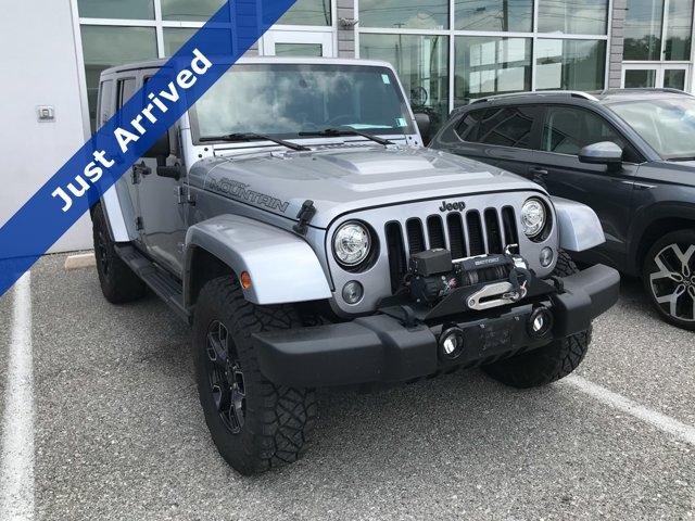 Used 2017 Billet Silver Metallic Clearcoat Jeep Smoky Mountain image 1