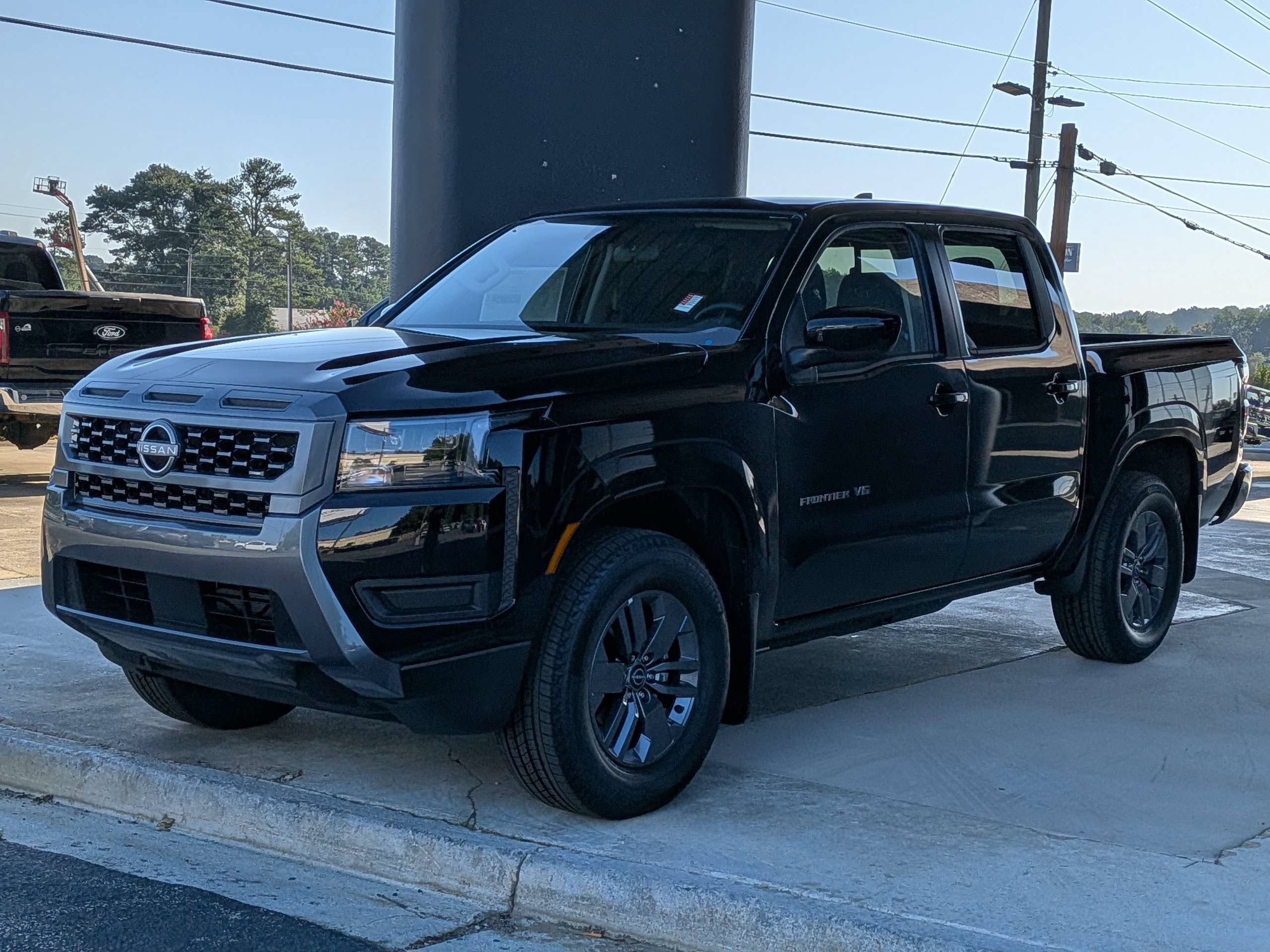 New 2027 Super Black Nissan Crew Cab SV image 7