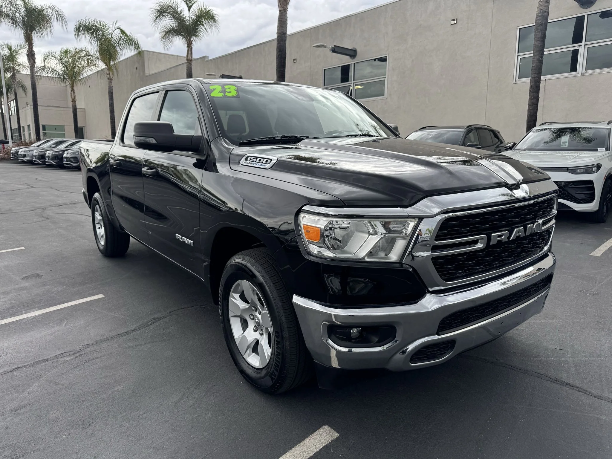 Used 2023 DIAMOND BLACK CRY Ram Big Horn image 1