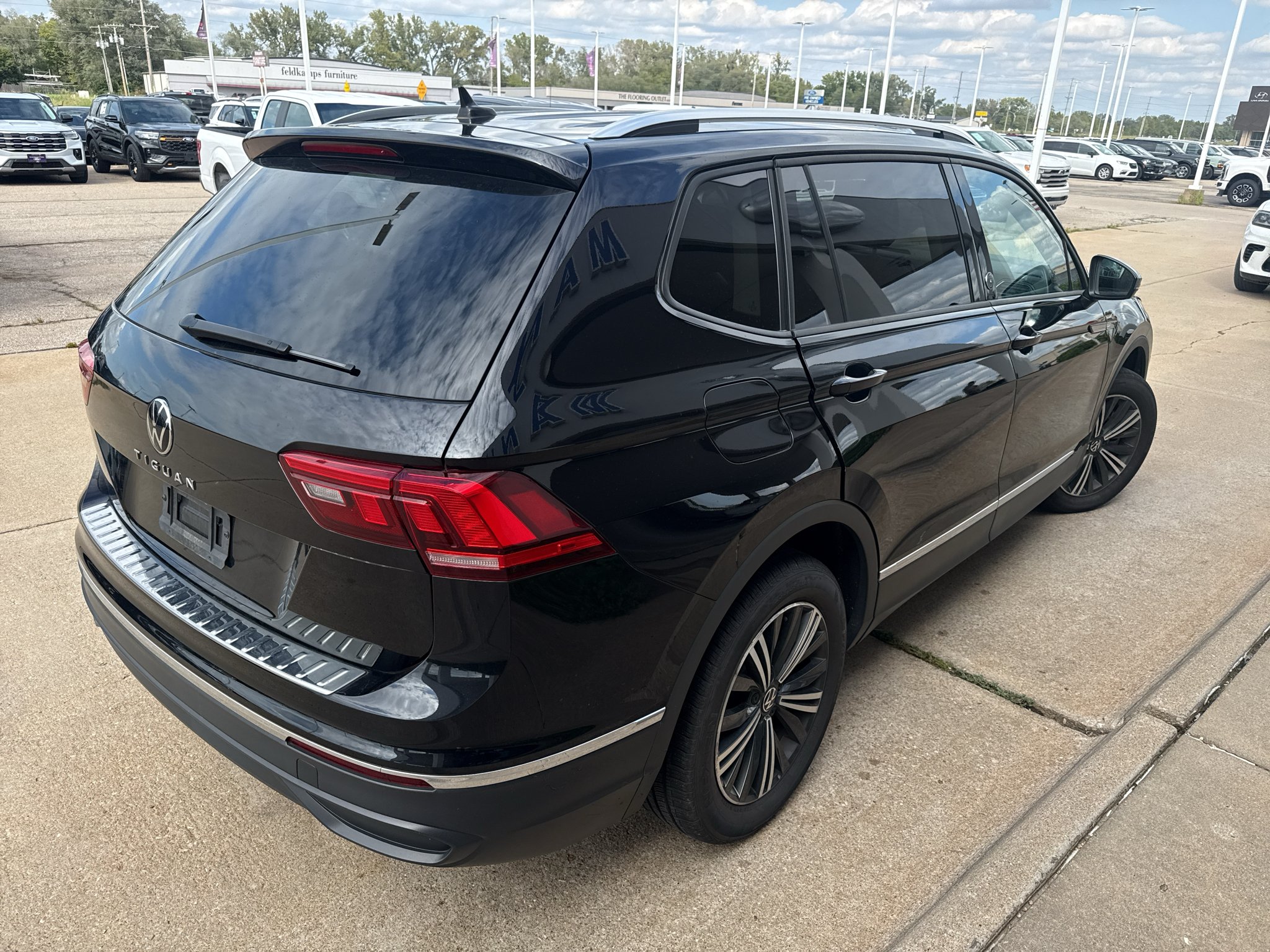 Used 2024 Deep Black Pearl Volkswagen Wolfsburg Edition image 6