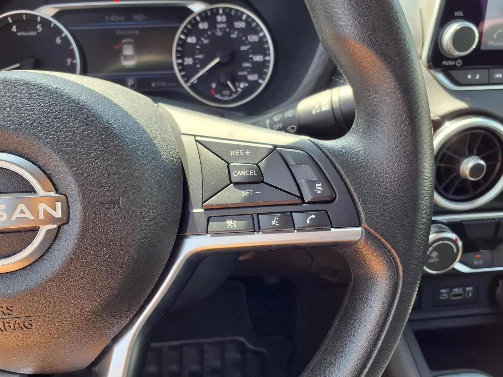 Used 2025 Rosewood Metallic Nissan SV image 11