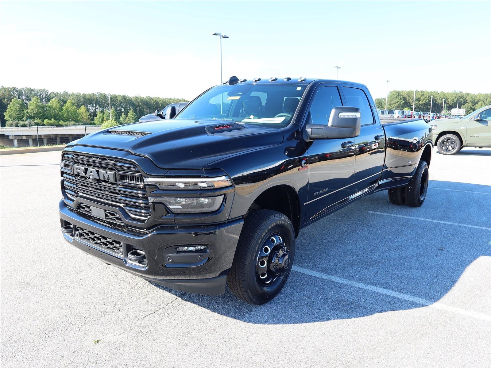 New 2026 Diamond Black Crystal Pearl-Coat Exterior Paint RAM Laramie image 3
