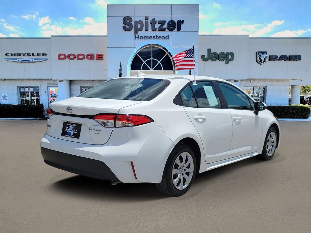 Used 2023 White Toyota LE image 2