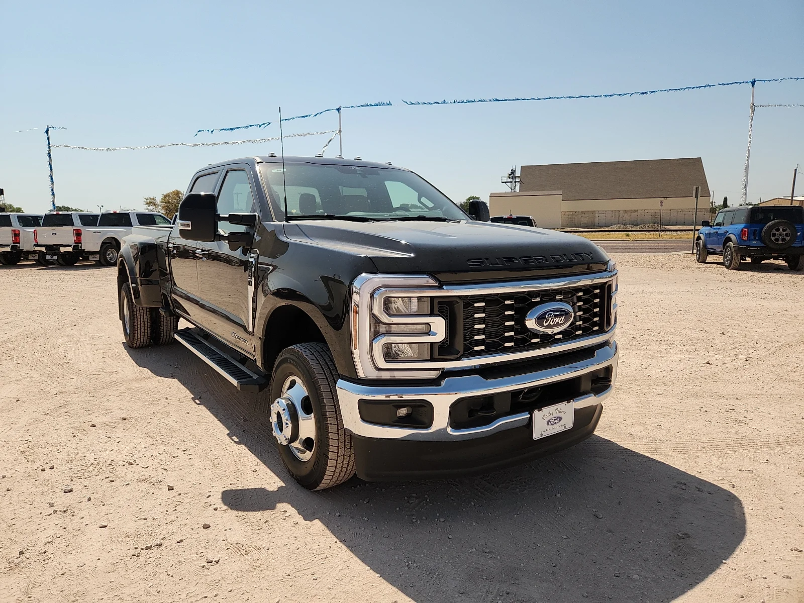 New 2026 Black Metallic Ford Lariat image 1