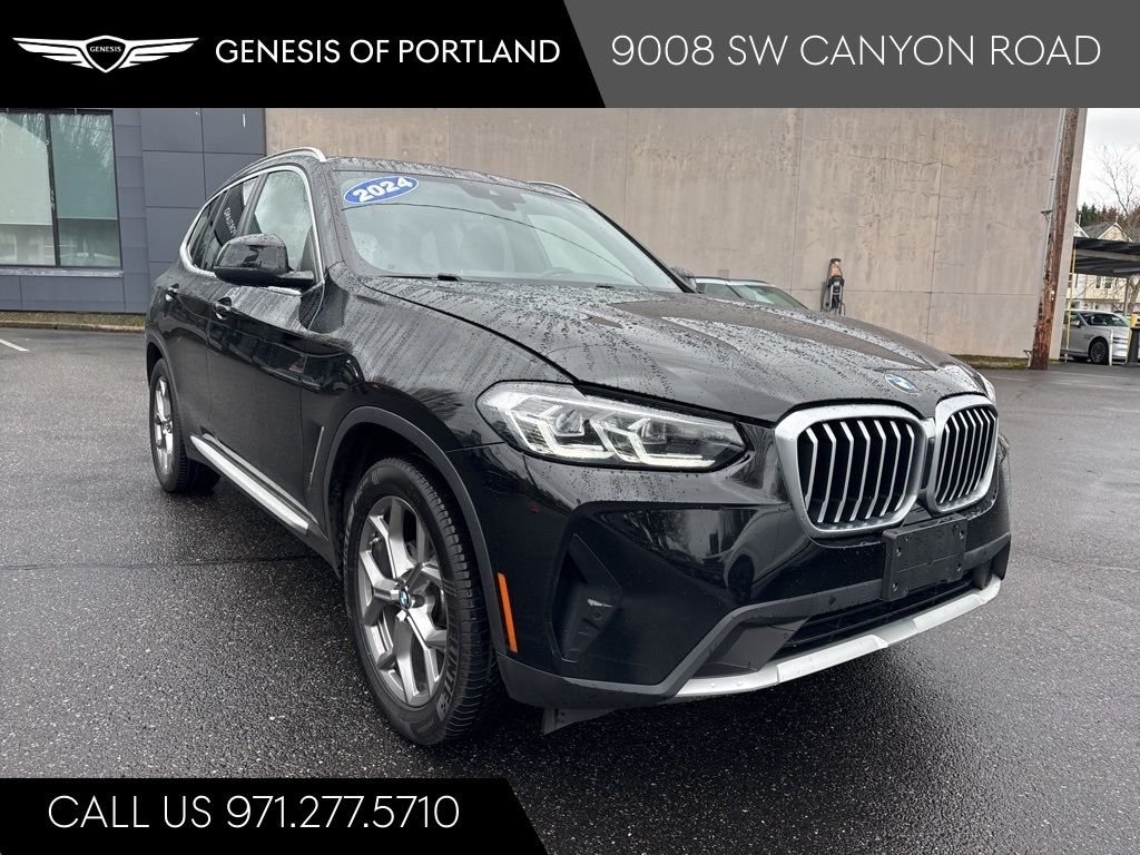 Used 2024 Black Sapphire Metallic BMW xDrive30i image 1