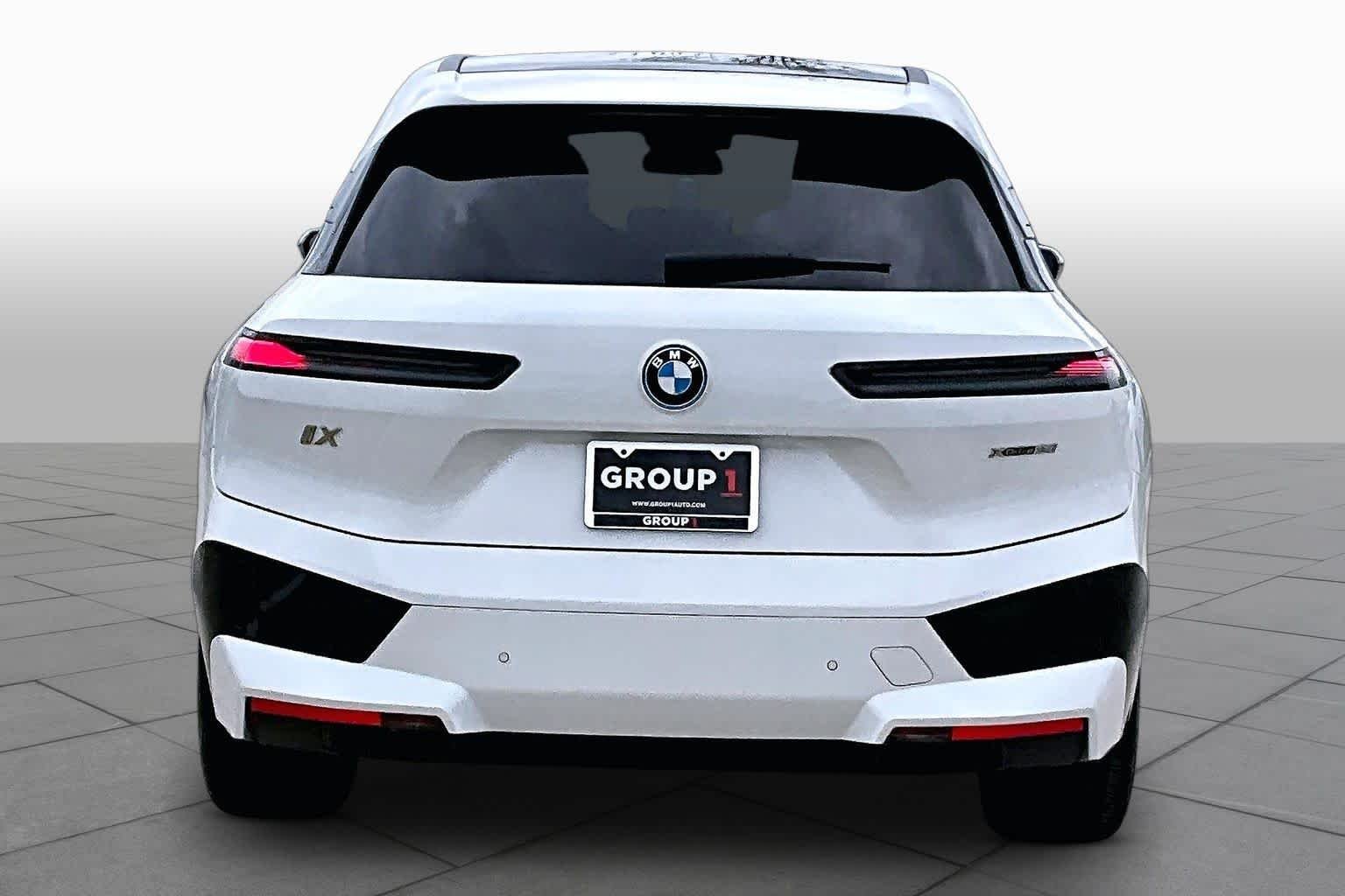 Used 2024 Mineral White Metallic BMW xDrive50 image 4