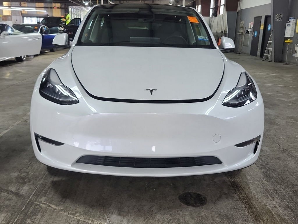 Used 2023 Tesla Model Y Base with VIN 7SAYGDED9PF956853 for sale in Kansas City