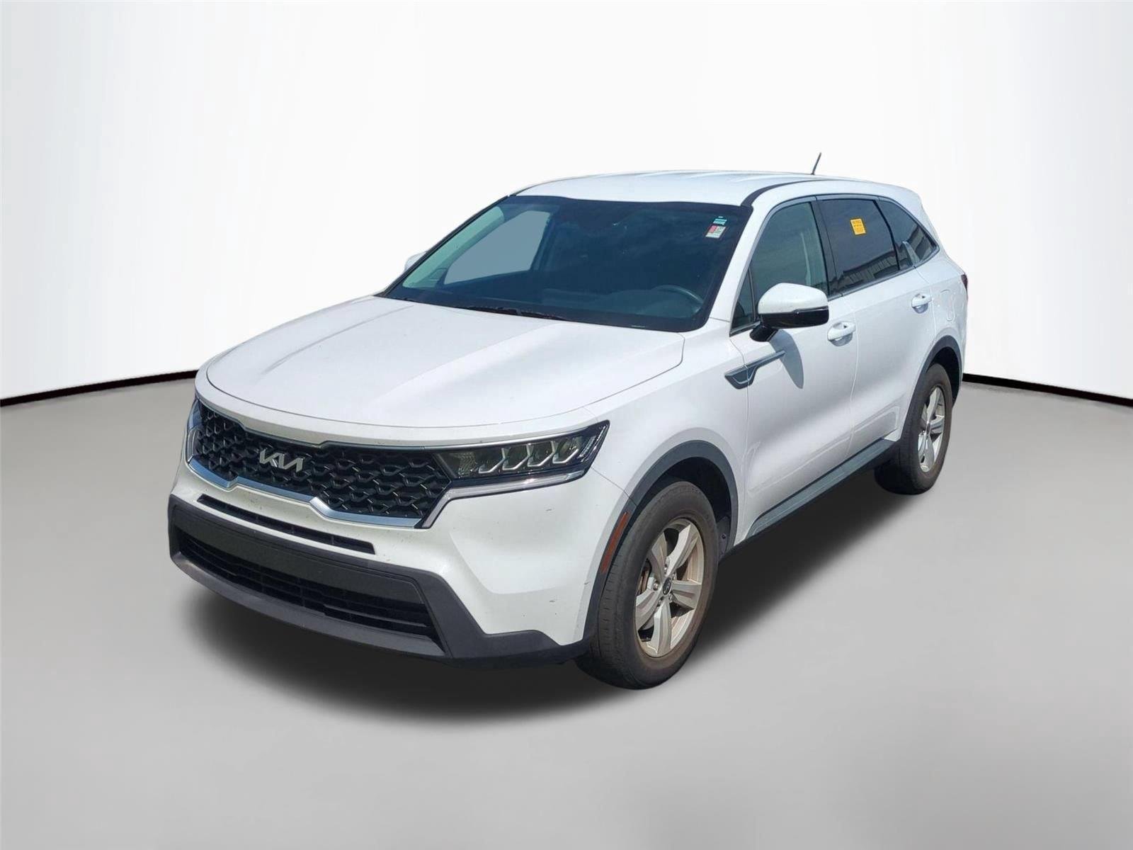 Used 2023 Glacial White Pearl Kia LX image 1