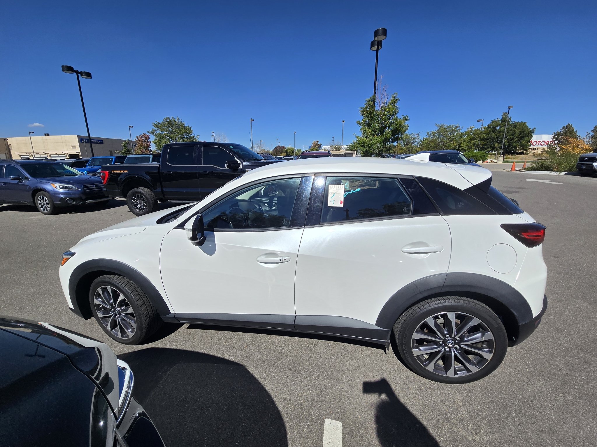 Used 2019 Snowflake White Pearl Mazda Touring image 2