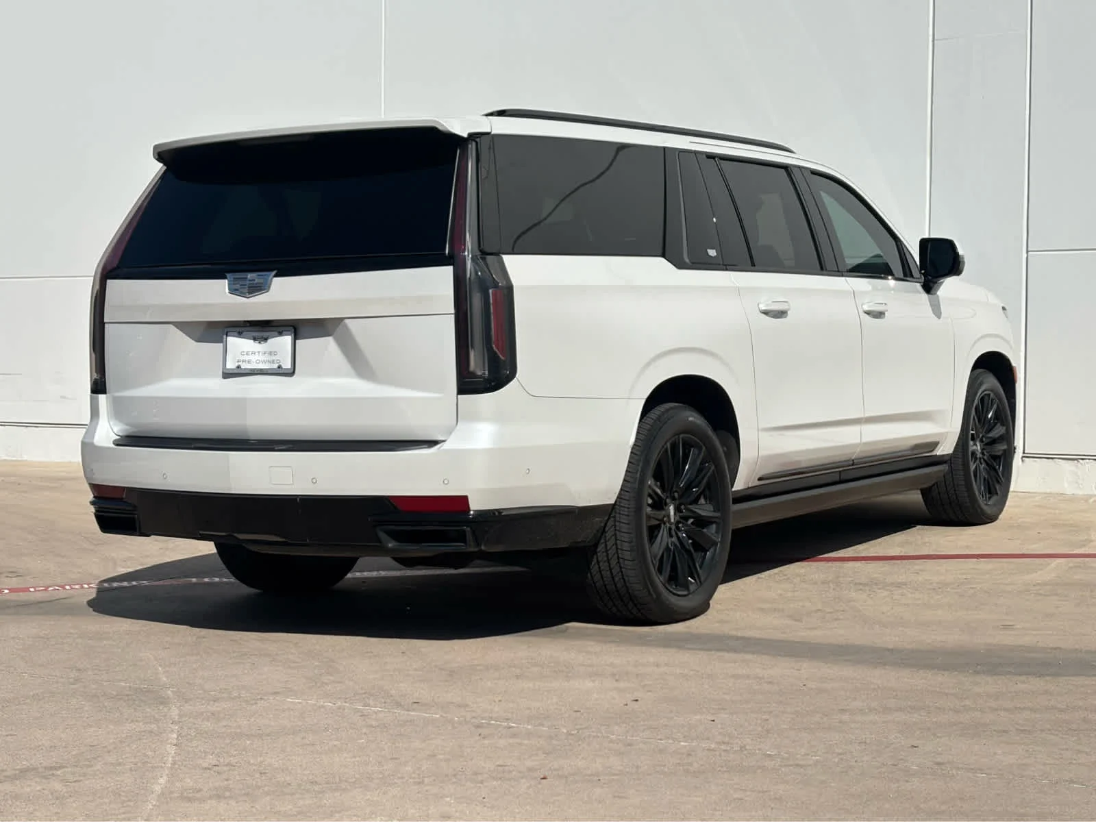 Used 2023 CRYSTAL WHITE TRICOAT Cadillac 4WD Sport image 4