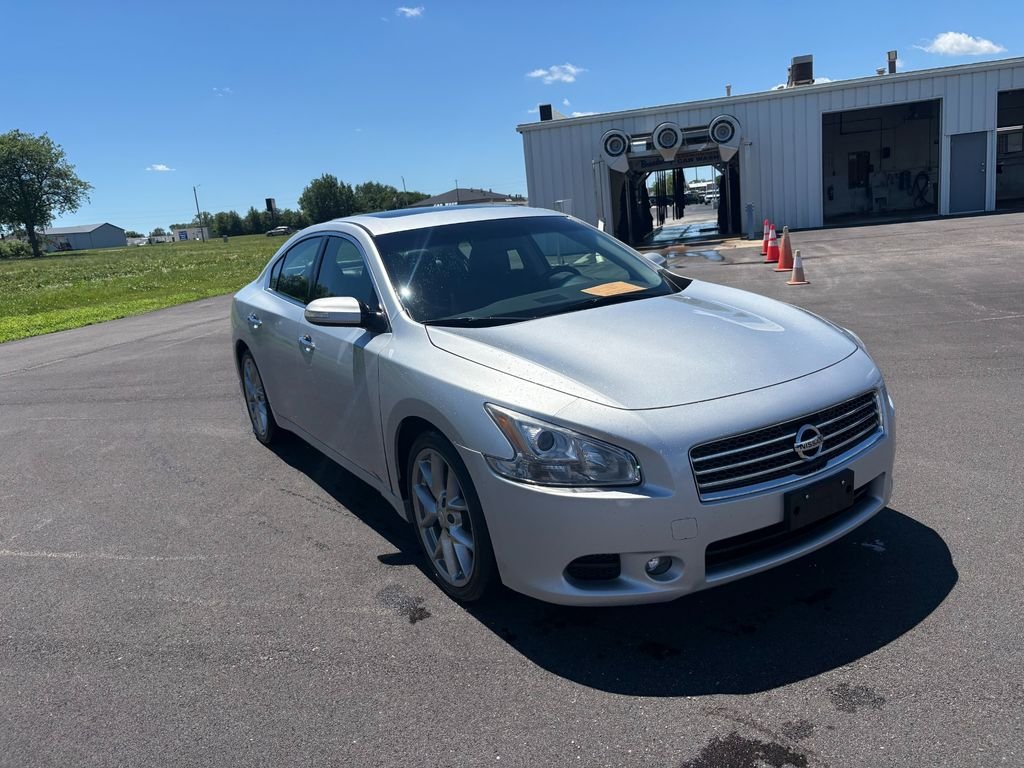Used 2010 Radiant Silver Metallic Nissan 3.5 SV image 1