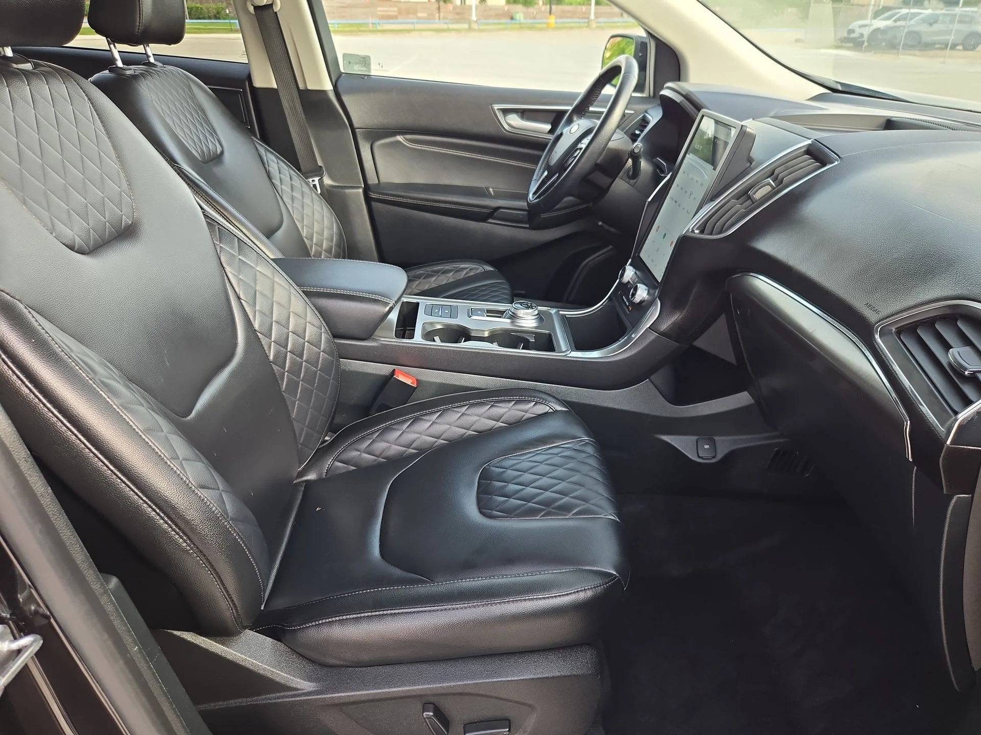 Used 2024 Black Metallic Ford Titanium image 30