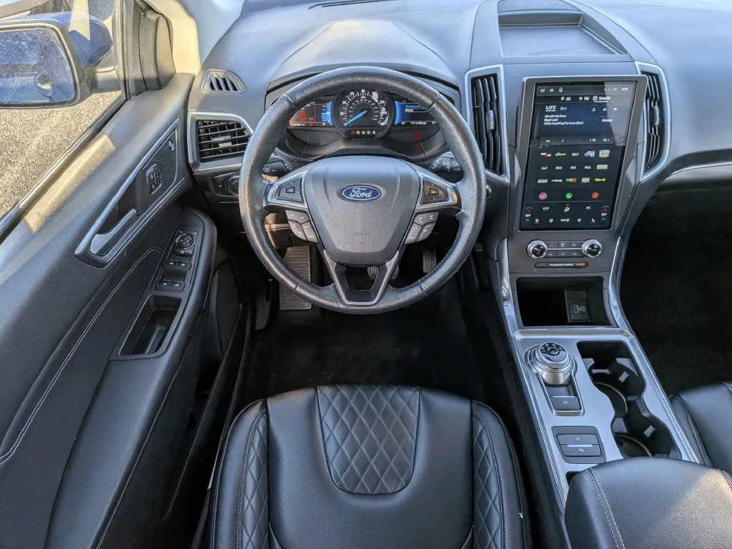 Certified Used 2024 Blue Metallic Ford Titanium image 16