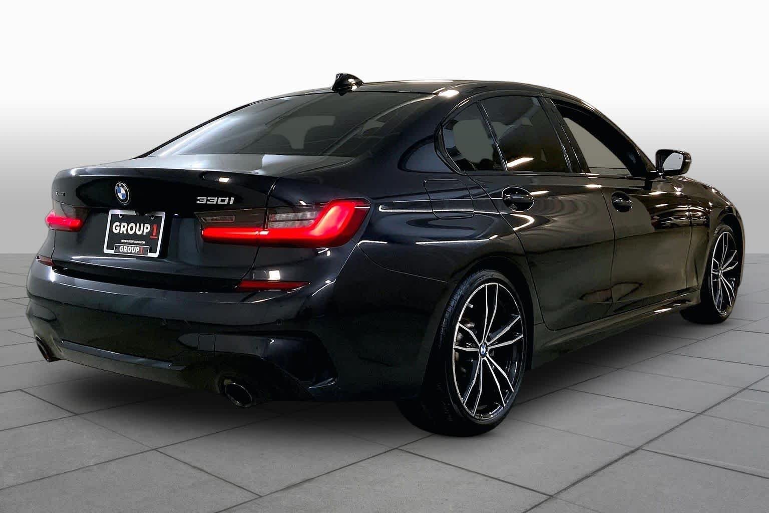 Used 2021 Black Sapphire Metallic BMW 330i xDrive image 12