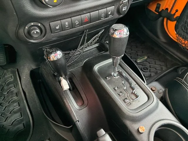Used 2013 Orange Jeep Unlimited Rubicon image 16