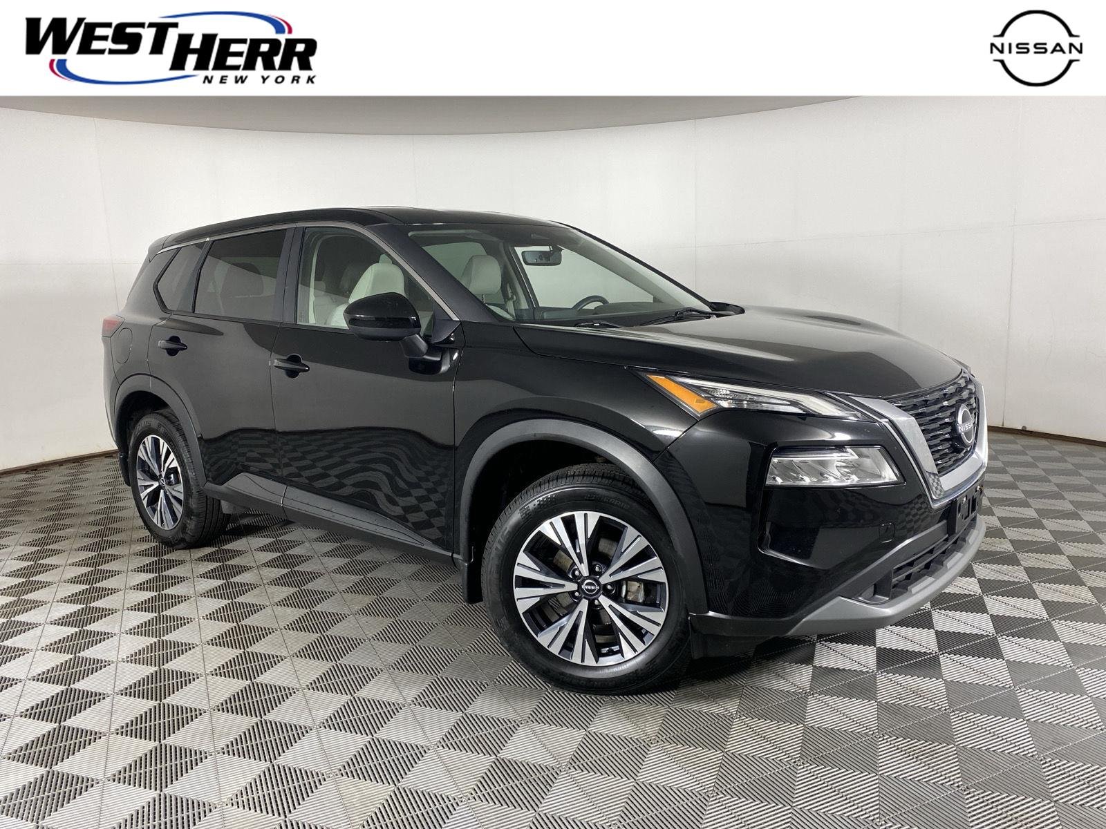 Used 2023 Super Black Nissan SV image 1