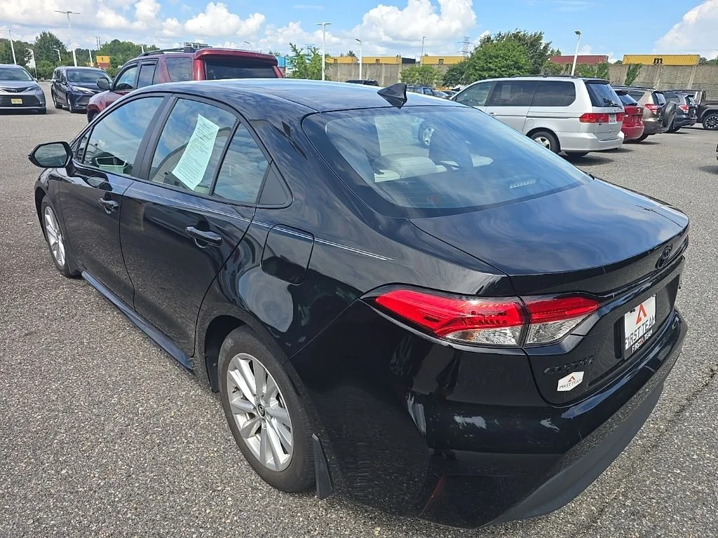 Used 2024 Black Toyota LE image 7