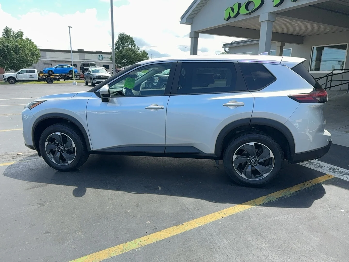Used 2025 Brilliant Silver Metallic Nissan SV image 3