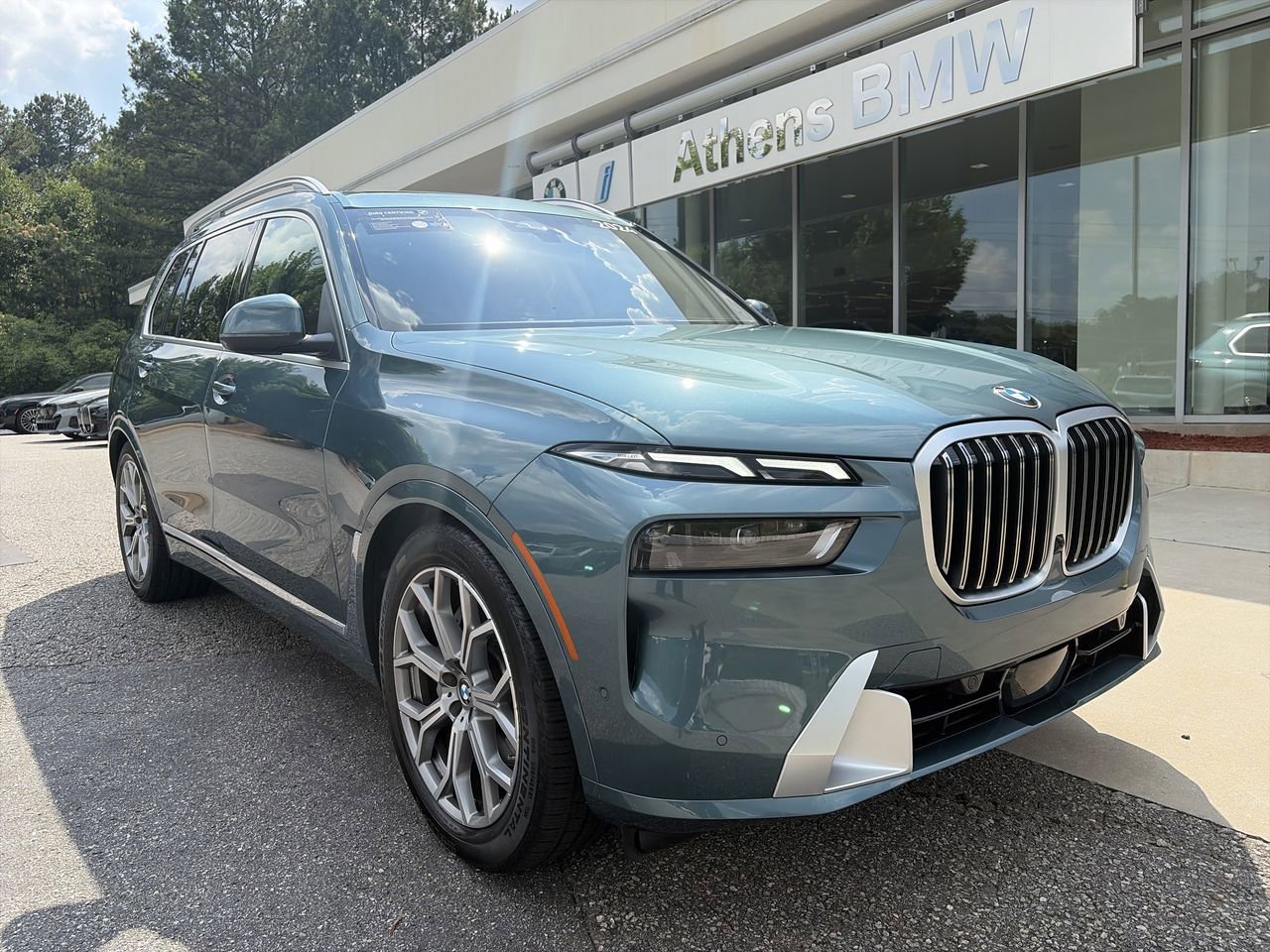 Used 2024 Blue Ridge Mountain Metallic BMW xDrive40i image 1