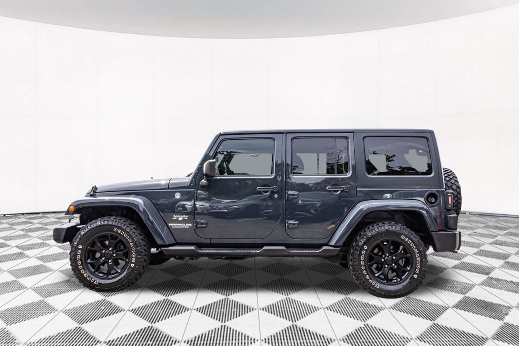 Used 2017 Black Jeep Unlimited Sahara image 7