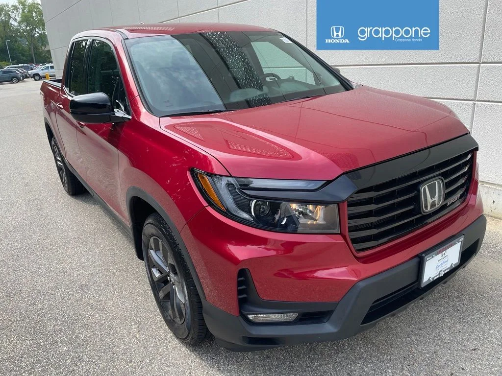Used 2021 Radiant Red Metallic II Honda AWD SPORT image 1