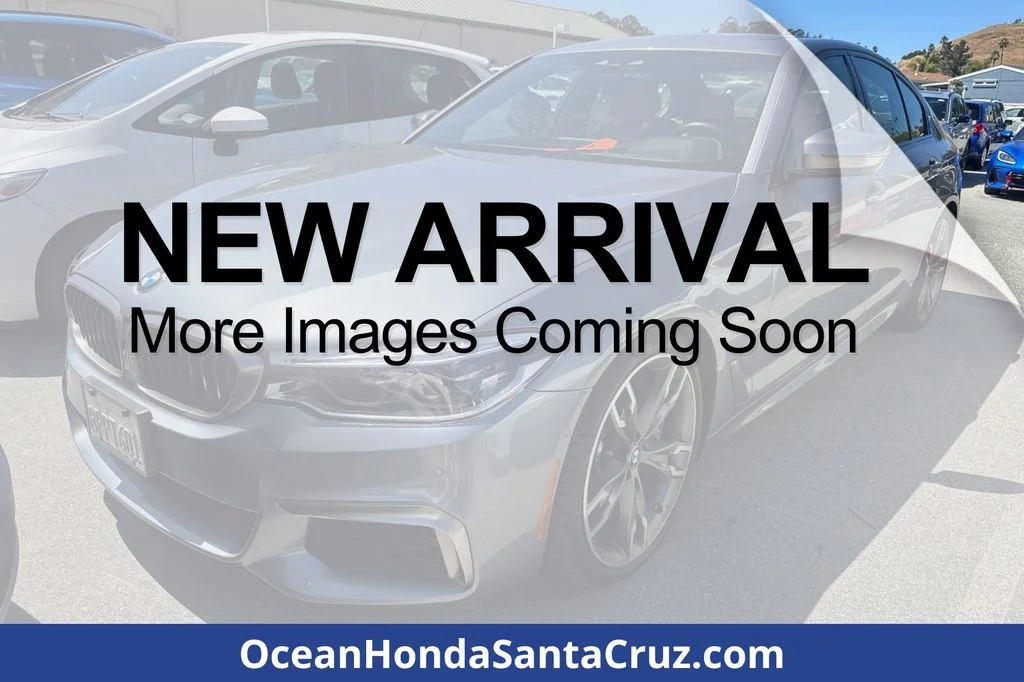 Used 2020 Bluestone Metallic BMW M550i xDrive image 1