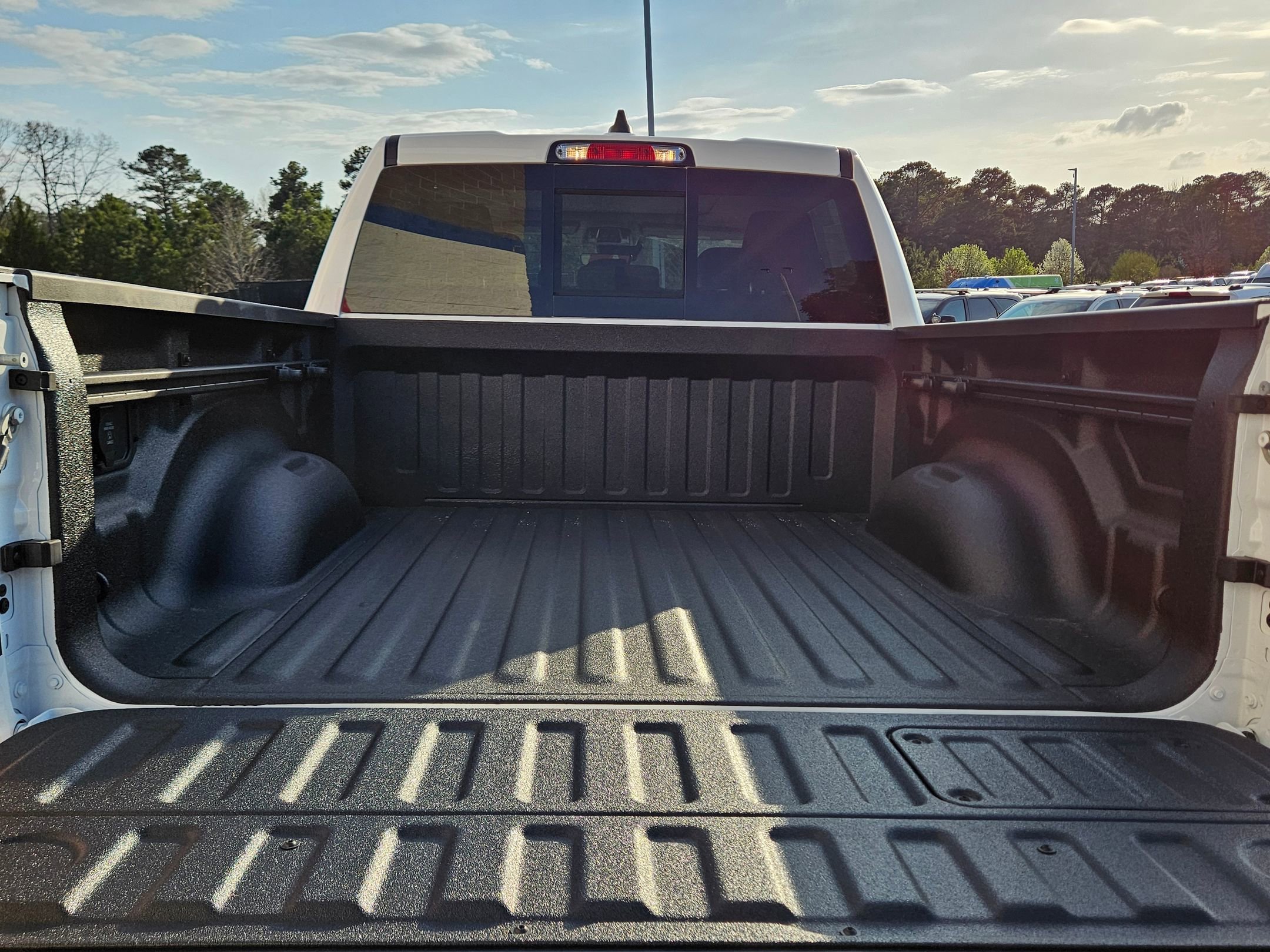 New 2026 Bright White Clear-Coat Exterior Paint RAM Laramie image 25
