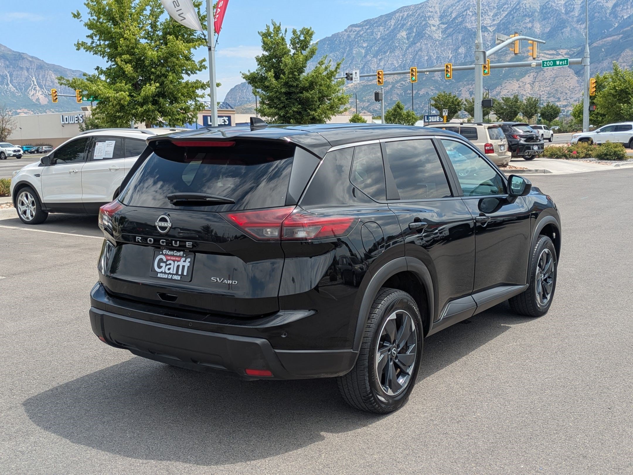Used 2024 Super Black Nissan SV image 3