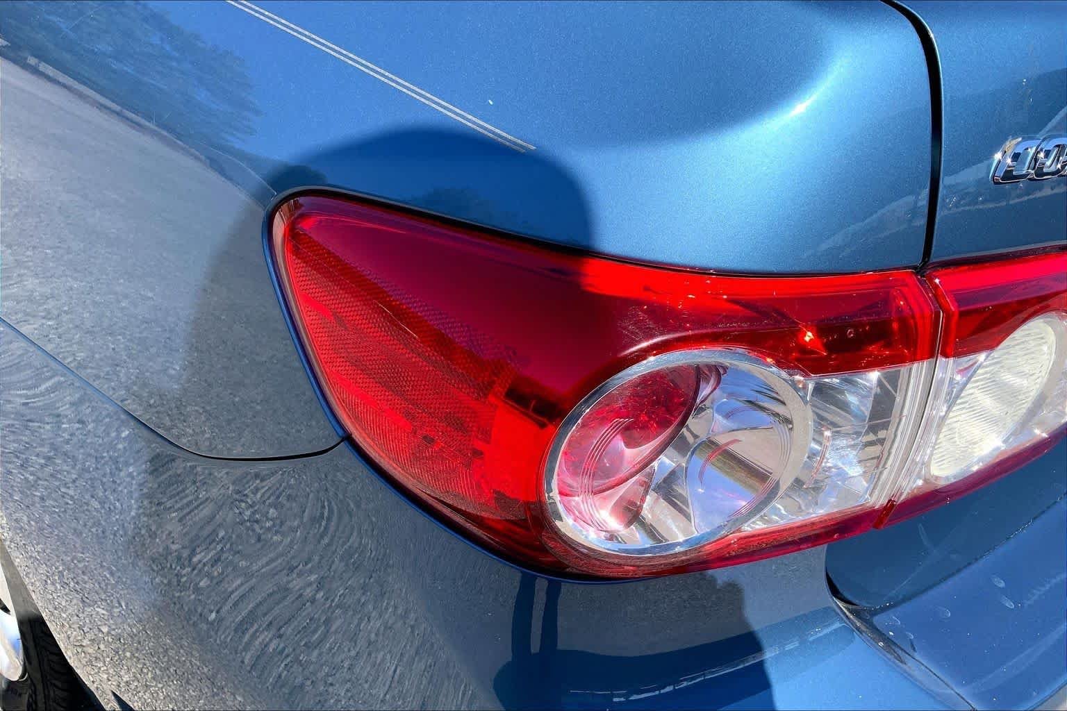 Used 2013 Tropical Sea Metallic Toyota LE image 28