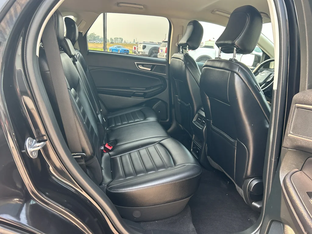 Used 2023 Agate Black Metallic Ford SEL image 21