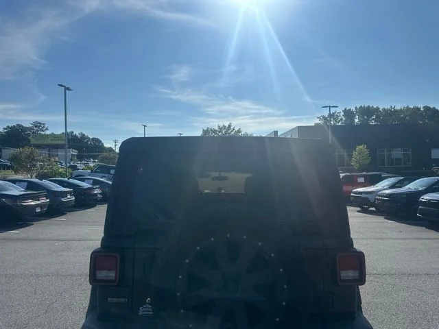 Used 2021 Black Jeep Unlimited Sport image 4