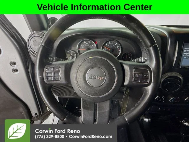 Used 2014 Billet Clearcoat Metallic Jeep Unlimited Sport image 10