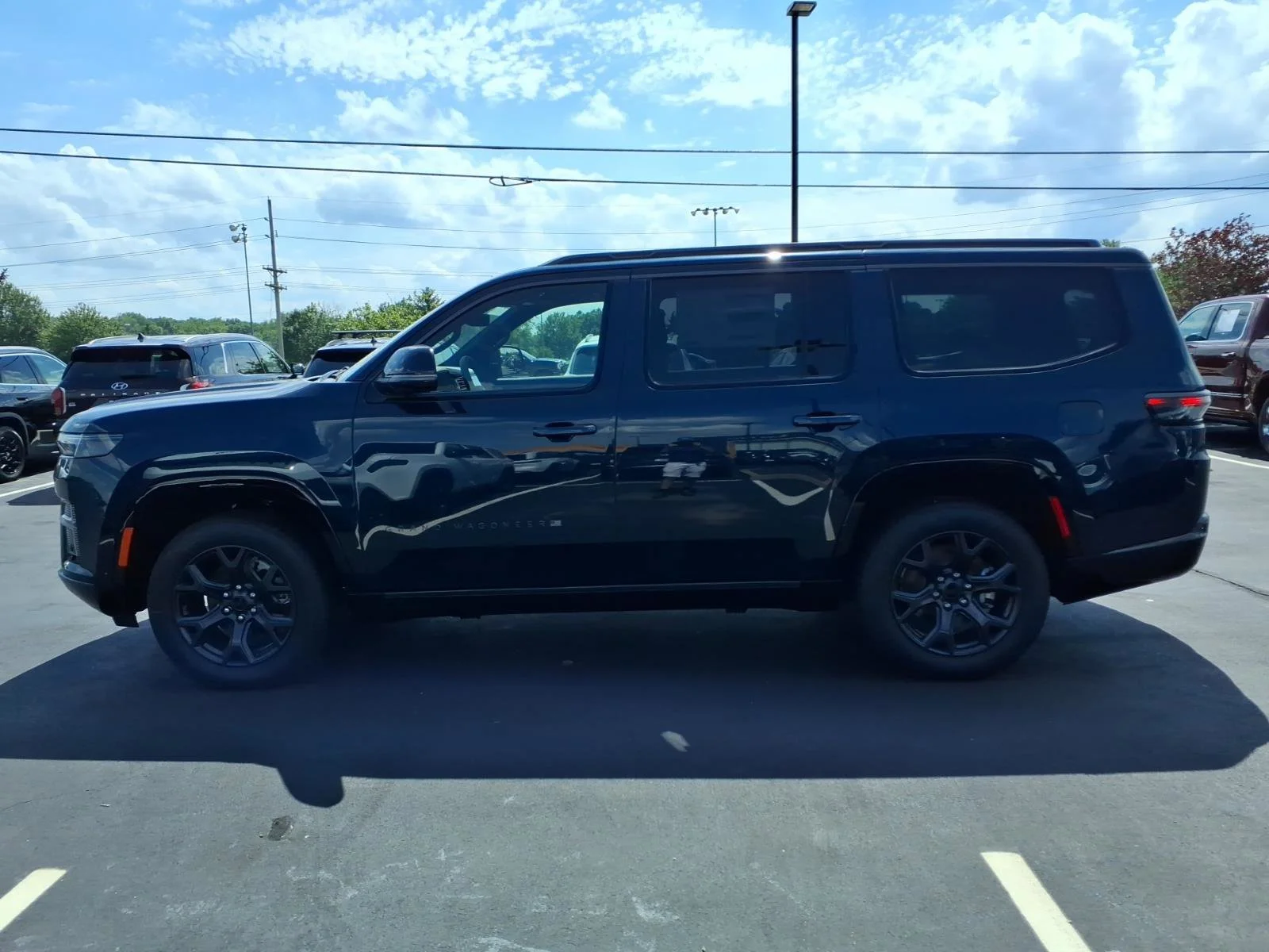 New 2026 Fathom Blue Pearlcoat Jeep Limited Altitude image 3