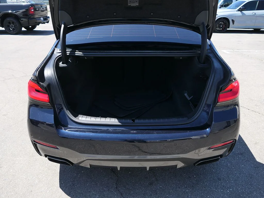 Used 2023 Carbon Black Metallic BMW M550i xDrive image 24