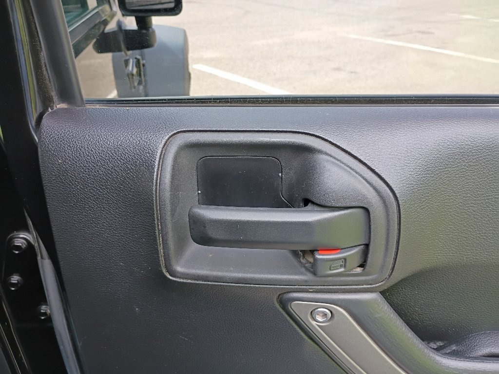 Used 2016 Black Clearcoat Jeep Sport image 14