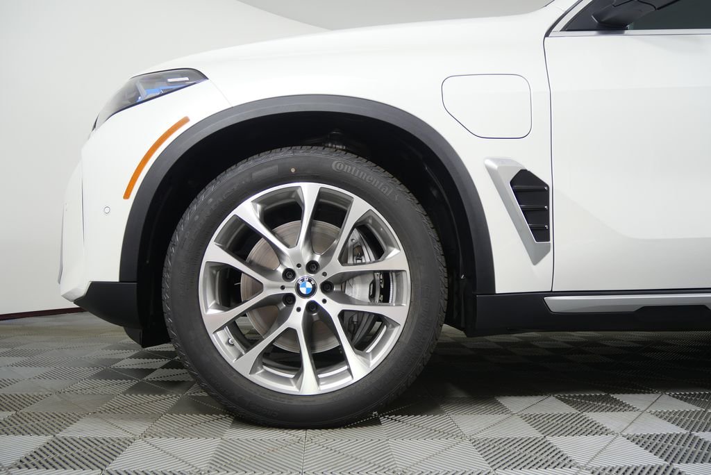 Used 2026 Mineral White Metallic BMW xDrive50e image 7