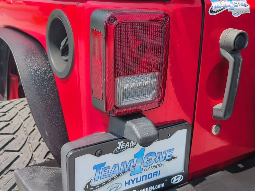 Used 2015 Firecracker Red Clear Coat Jeep Sport image 37