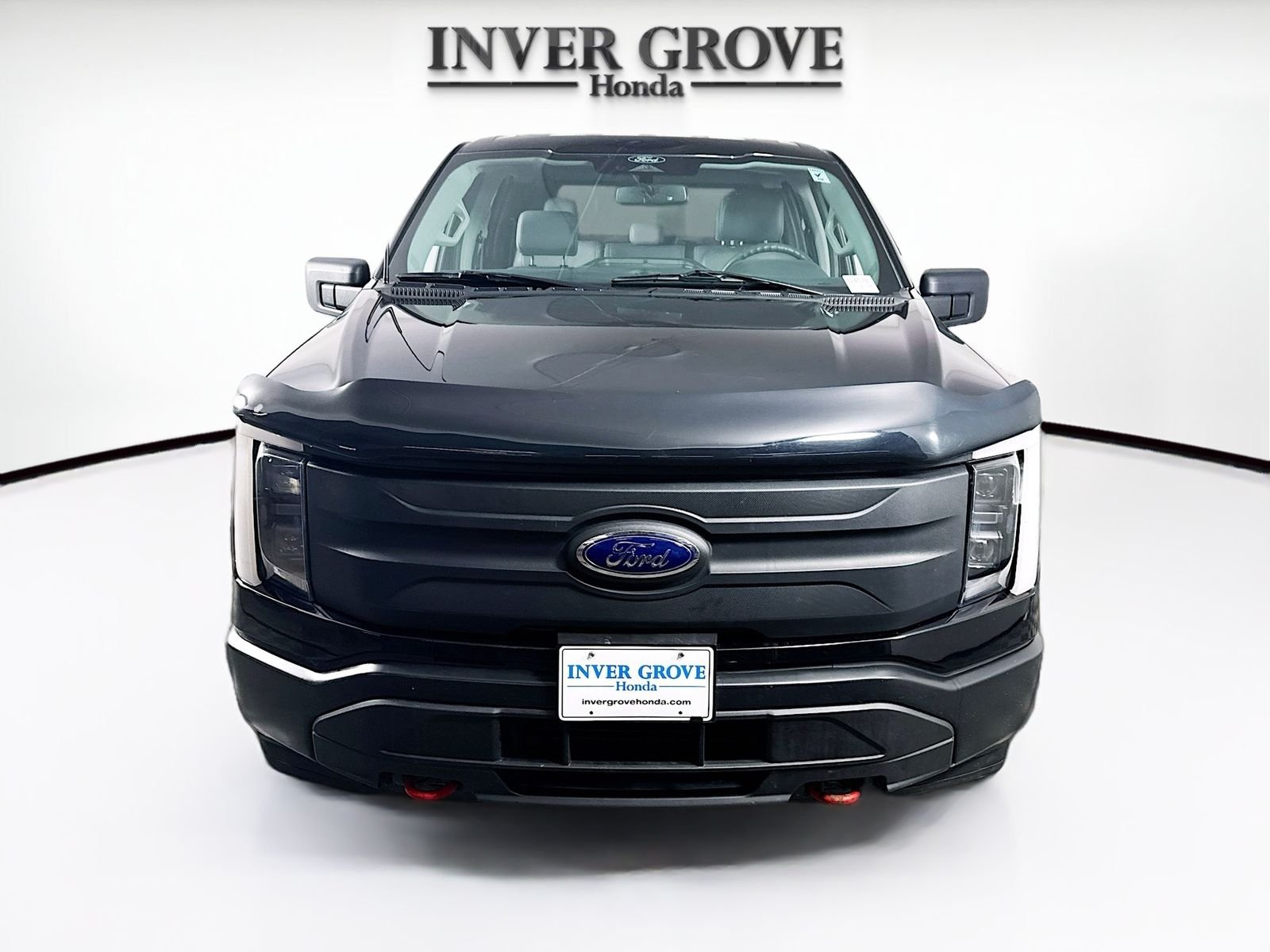 Used 2022 Ford F-150 Lightning Pro with VIN 1FTVW1EL6NWG06209 for sale in Inver Grove Heights, Minnesota