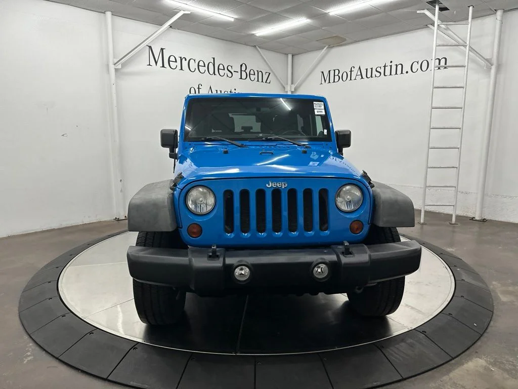 Used 2011 Blue Jeep Sport image 2