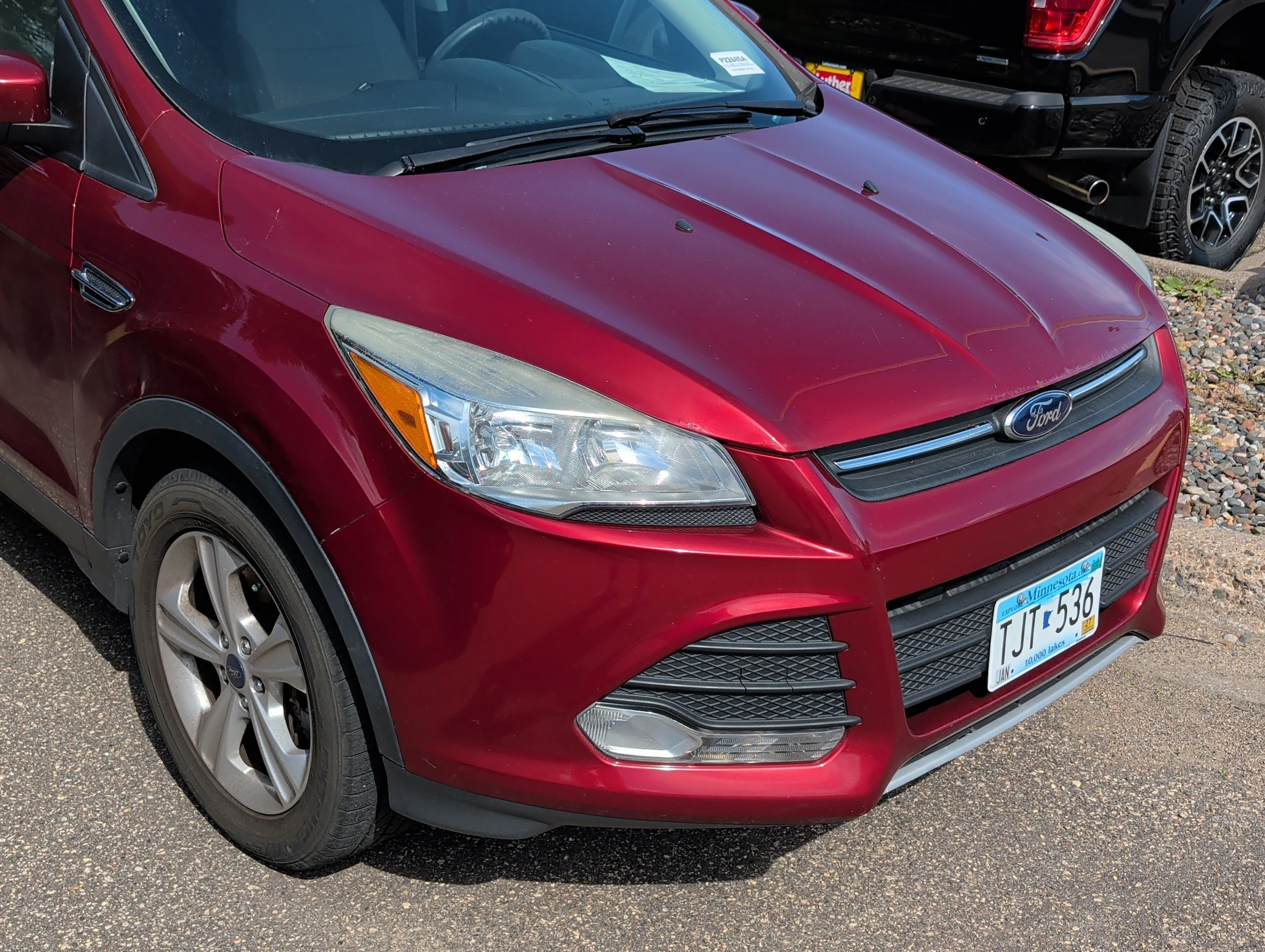 Used 2015 Ruby Red Metallic Tinted Clearcoat Ford SE image 6