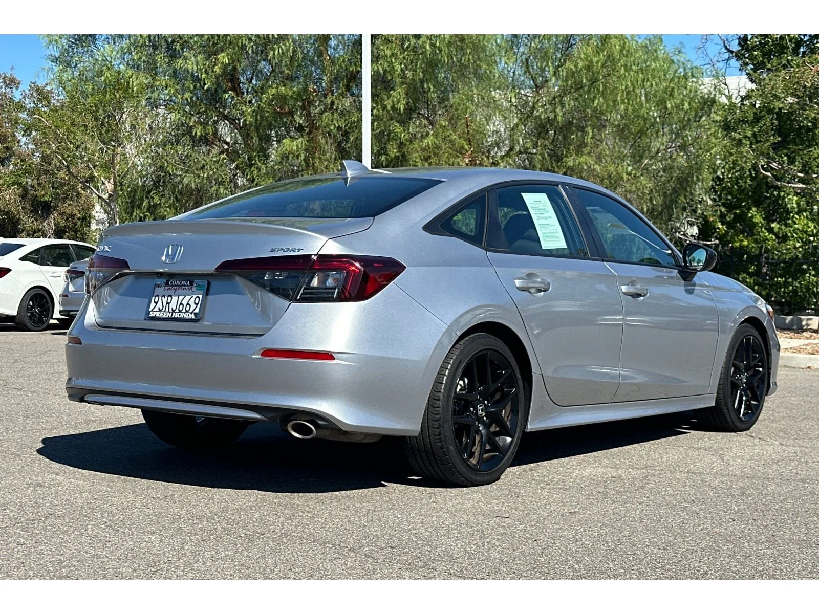 Used 2025 Solar Silver Metallic Honda Sport image 6